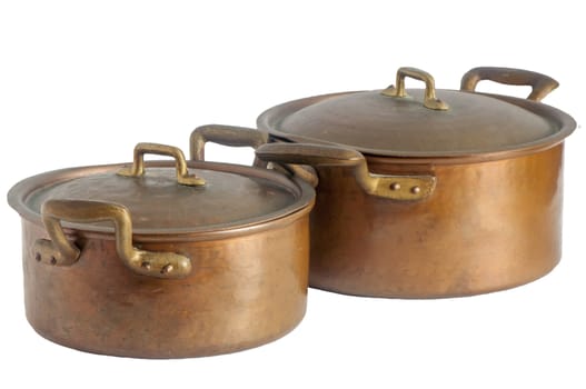 Two antique copper pots on a white background