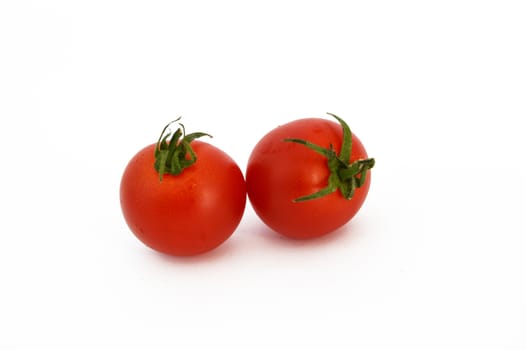 On white & copy space fresh healthy cherry tomatoes stock pictures