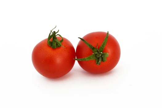 On white & copy space fresh healthy cherry tomatoes stock pictures