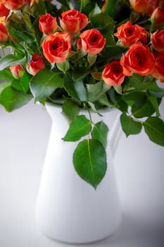 A big Bouquet of fresh Red Roses on a white background