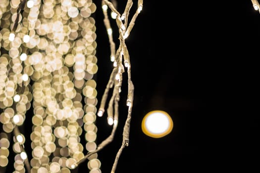 Defocused selected christmas glittering lights.