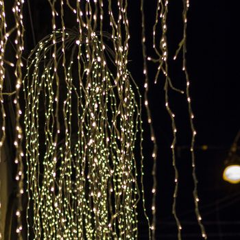 Defocused selected christmas glittering lights.