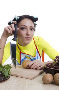 Housewife is preparing in the kitchen on a white background