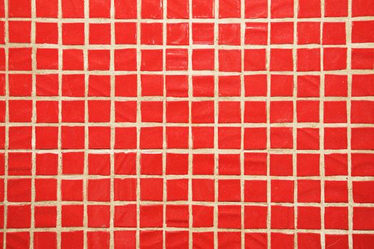 Texture of fine little ceramic tiles background. Red floor tiles