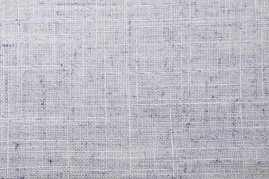 Detailed Closeup vintage old textured fabric burlap, rustic background in purple, grey. Canvas Macro Pattern. Natural Light Linen Texture.