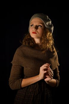 Sure, beautiful, snorting, stunning lady, woman, girl with good manners, gray beret, cap, red lips on black background, curly, short hear, nice dress, important, eyesight.