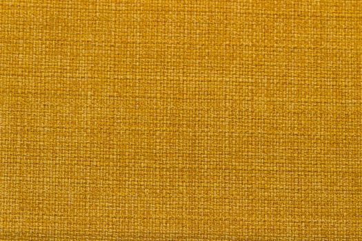 Rustic canvas fabric texture in Yellow Orange color.