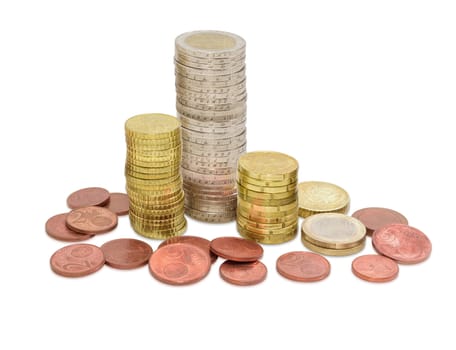 Euro coins from one cents to two euro on a light background, coins some denominations are stacked in columns 
