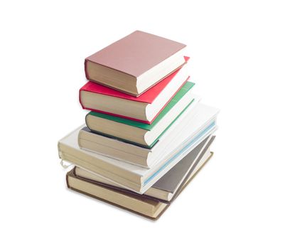 Stack of several old books different formats and cover design on a light background
