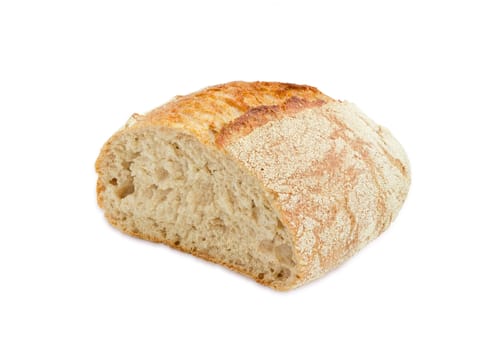 Half loaf of unleavened bread made from wheat and rye meal with bran on a light background
