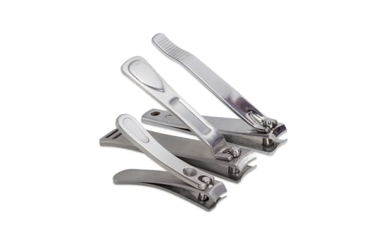 Three nail clippers different sizes in the compound lever style on a light background
