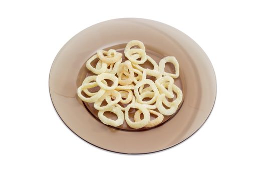 Potato chips with appearance of a fried squid rings and taste of a calamari on dark glass dish on a light background
