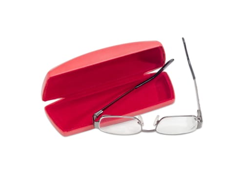 Modern pair of women's eyeglasses with single vision lenses and metal frame and open red spectacle case on a light background
