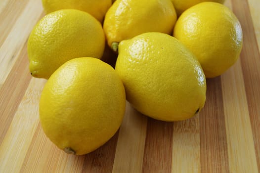 Lemon paintings on the finest wooden chopping board