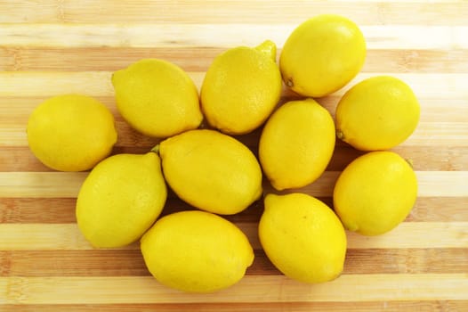 Lemon paintings on the finest wooden chopping board