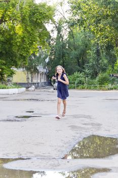 Photo of cute running girl with disheveled hair