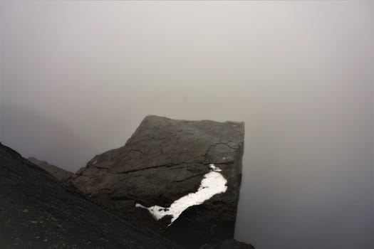 The Pulpit Rock (Preikestolen), the most famous tourist attraction in Ryfylke, towers an impressive 604 metres over the Lysefjord. The plateau is approximately 25 x 25 metres, flat and you can enjoy a spectacular view of the Lysefjord and surrounding mountains. But unfortunately not today, the fog ruined everything