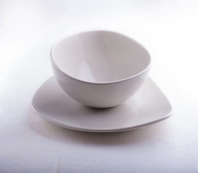 Two Empty bowls placed on a white surface.