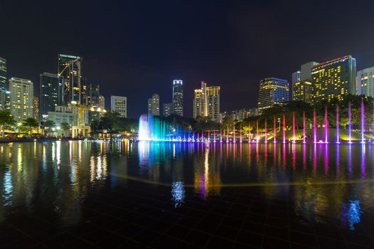 Kuala Lumpur Malaysia City Skyline from KLCC Park by Symphony Lake at Night