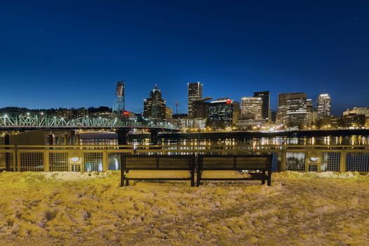 Portland Skyline View from Eastbank Esplanade during evening blue hour on a cold winter night