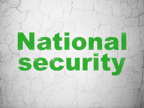 Safety concept: Green National Security on textured concrete wall background