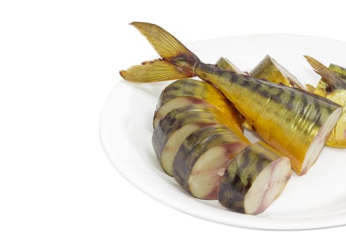 Fragment of a white dish with several slices of a cold-smoked Atlantic mackerel on a light background
