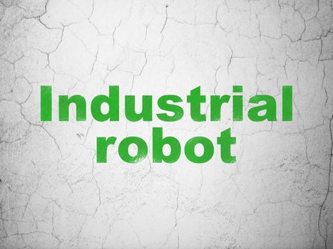 Manufacuring concept: Green Industrial Robot on textured concrete wall background