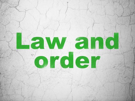 Law concept: Green Law And Order on textured concrete wall background