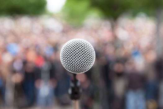 Political protest. Public demonstration. Microphone.