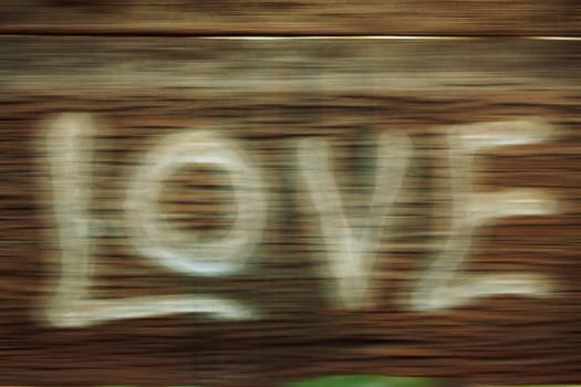 Blurring of love on the wooden floor.