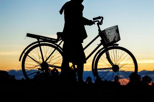 farmers are bicycle trailers with the silhouettes.