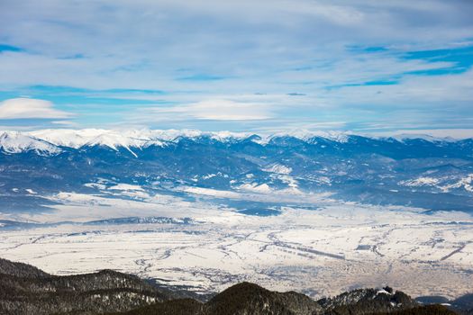 Panorama view of a winter day on the mountain in the ski centar Bansko.