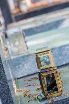 candle lantern on the stone grave