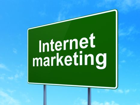 Marketing concept: Internet Marketing on green road highway sign, clear blue sky background, 3D rendering