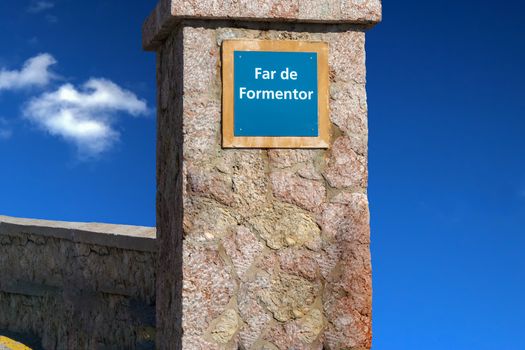 Road sign with inscription in Spanish "Far de Formentor" just before the
Lighthouse Formentor, Mallorca, Balearic Island, Spain.