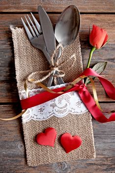 Cutlery set inside pouch with silk ribbon and a gift box