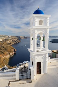 Blue and white orthodox church bell tower. Firostefani, Santorini Greece. Copyspace