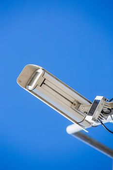 close up image of CCTV security camera fixed on a pole metalic