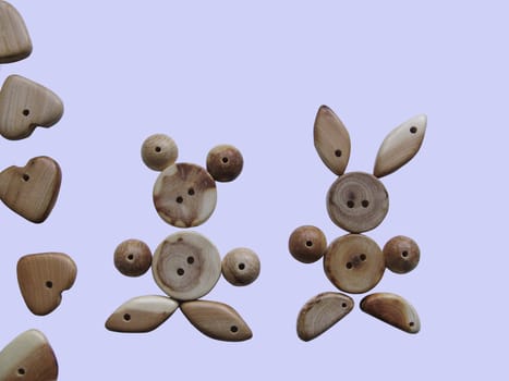 Handicraft goods,  wooden beads. Two animals. Background