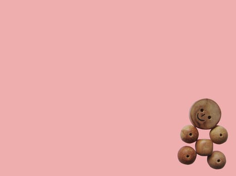 Handicraft goods,  wooden beads. Baby. Background