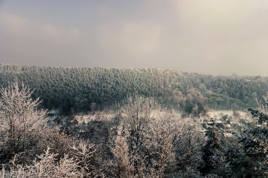 retro beautiful mountain view from above forest winter in Ukraine