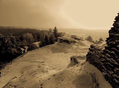 the extraordinary beauty of the winter landscape on top of a hill retro