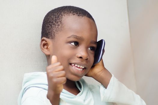 This child agree with what his mother told him meaning by this gesture and smile