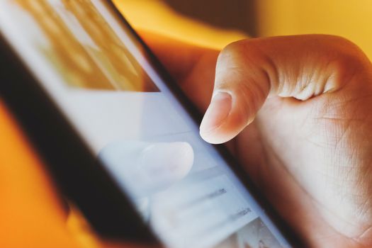 image of hand using digital tablet close up, social media life