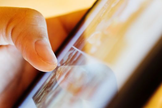 image of hand using digital tablet close up, social media life