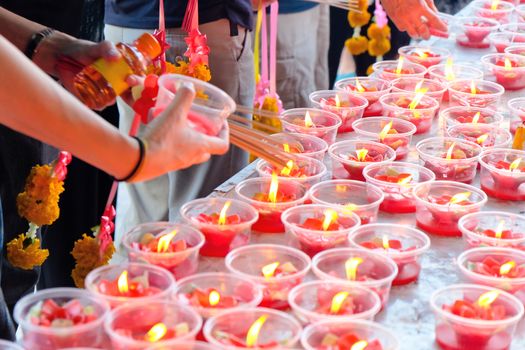 People light the candle at chinese temple