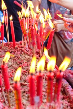 People light the candle at chinese temple