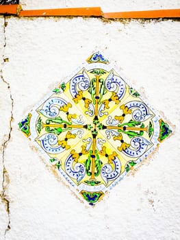 Closeup of a wall decoration on a wall on the beach