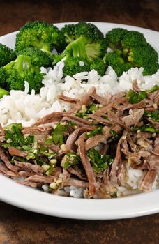 boiled beef with pungent spokes sauce garnish rice with broccoli