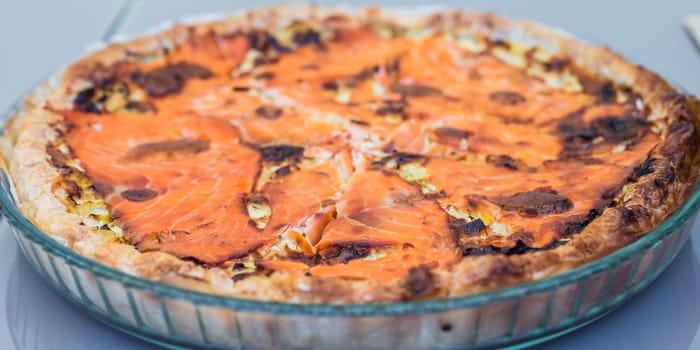 delicious seafood pizza with salmon fish and pepper
